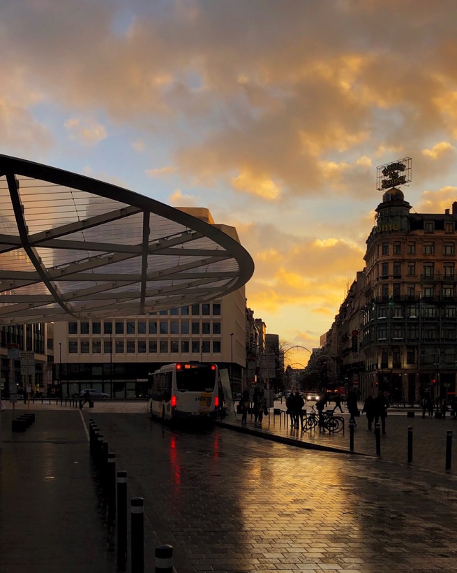 The sun going down near the Rogier metro station.